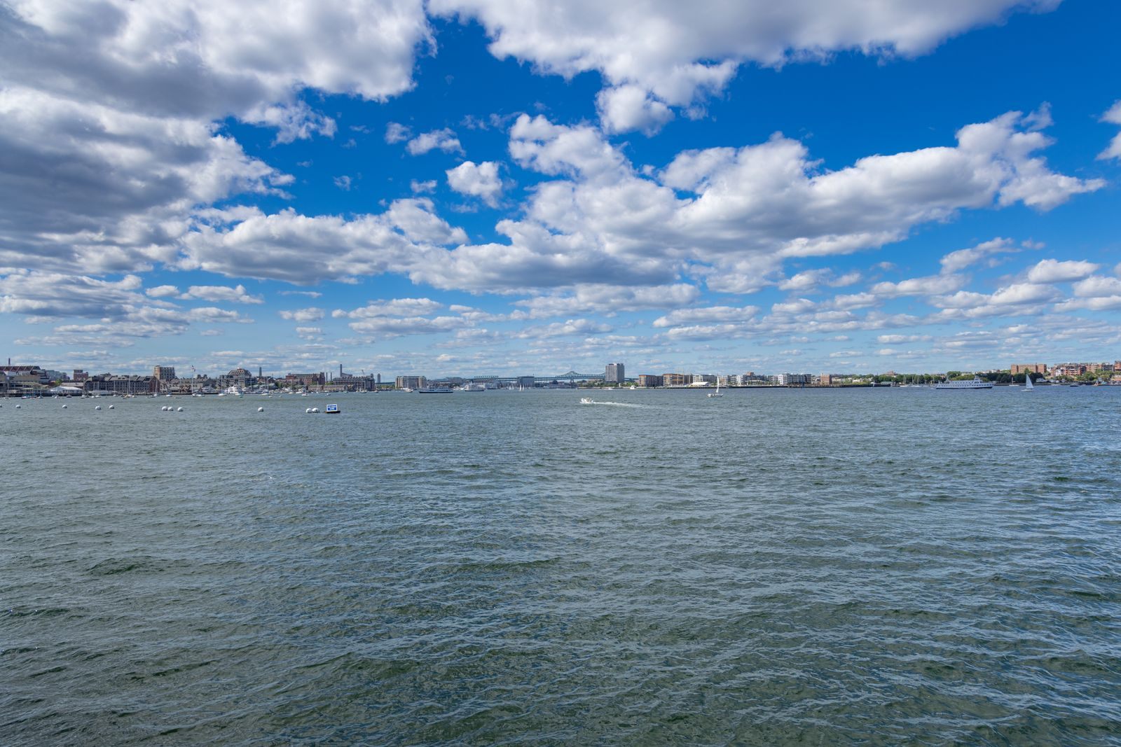 Boston Harbor under a blue sky, a gateway among US cruise ports on the East Coast